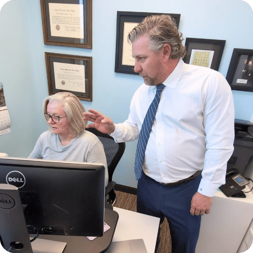 Attorneys Zach and Beverly work on client cases