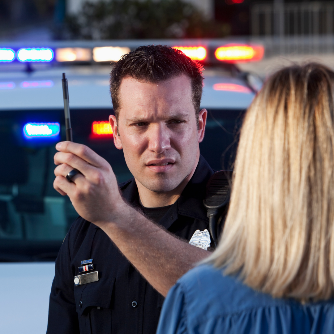 Officer checking for DUI 